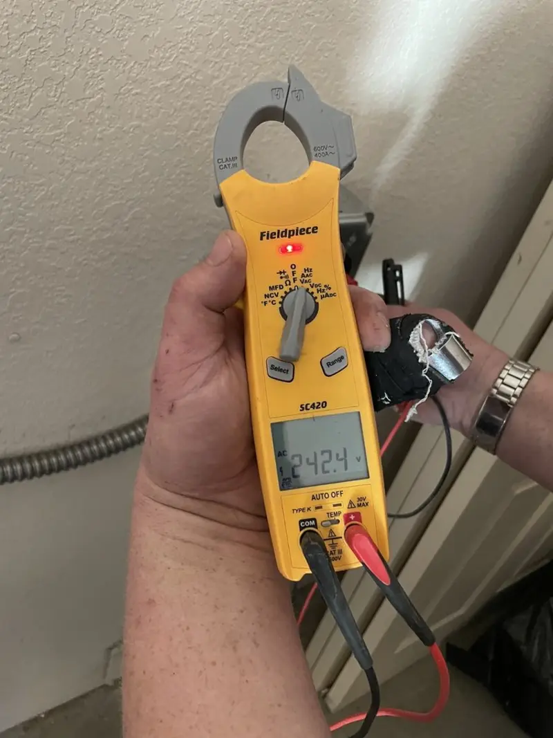 Voltage testing with clamp meter during Hot Tub / Pool Electrical Wiring in North East